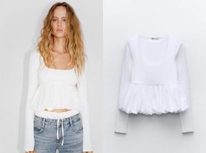 White Peplum Long Sleeve Top