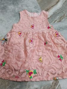 Adorable Pink Lace Dress with Butterfly Motifs