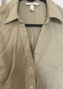 Sleeveless Collared Button-Up Top