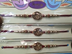 Om Fancy Trendy Metal Rakhi . Pack Of 3