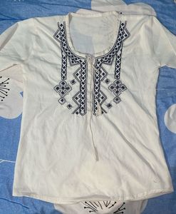 Embroidered White top