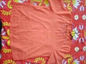 Elegant orange Embroidered top