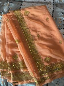 Elegant Peach Saree with Embellishments
