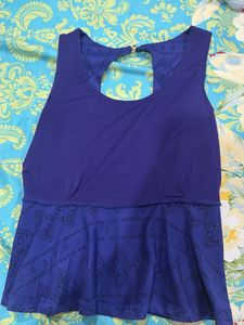 Blue Peplum Top with Cutout Detail