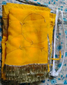 Embroidered Yellow Rajasthani poshak.