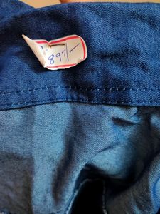 Blue jacket ( can also be used as top).Its in my cupboard for 1 year now. Haven't been used.