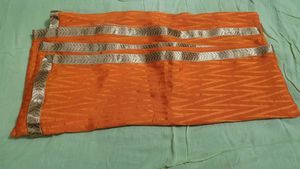 Orange dupatta with Silver Border