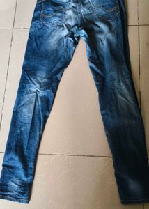 Distressed Denim Jeans
