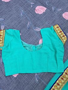 Elegant Teal Embroidered Saree