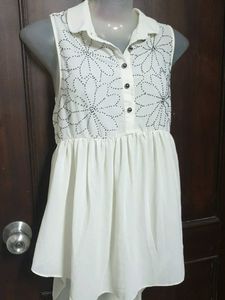 Cream Sleeveless Floral Top