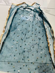 Elegant Teal Kurta Set with Intricate Embroidery