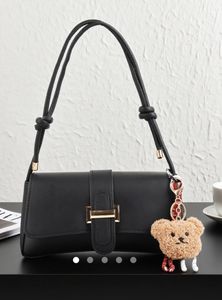 Chic Black Shoulder Bag with Charm