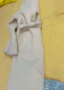 beige trench coat