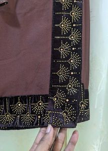 Elegant Brown Saree with Embellished Blouse
