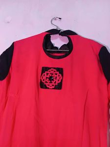 Vibrant Kurti with Black Embellishments