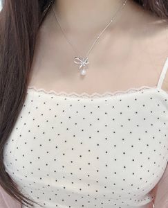 Delicate Bow Pendant Necklace