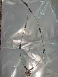 Elegant Gold Necklace with Emerald Pendant