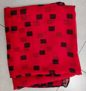 Vibrant Red Saree with Black Diamond Print