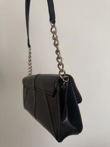 Chic Black Shoulder Bag with Chain Detail