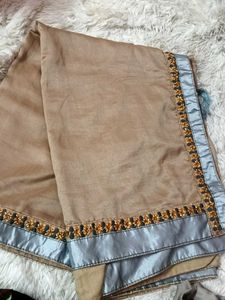 Elegant Beige Saree with Embellished Border