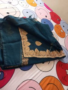 Beautiful Teal Saree with Gold Border