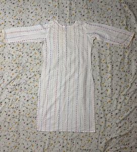 Elegant White Kurta with Colorful Embroidery