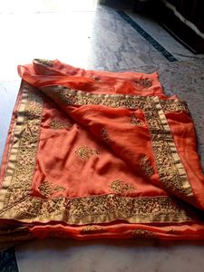 Elegant Orange Embroidered Saree