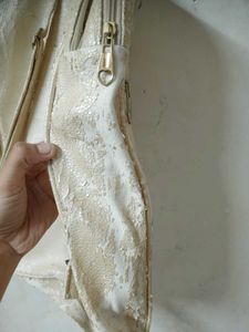 Quilted Backpack with Embellishments