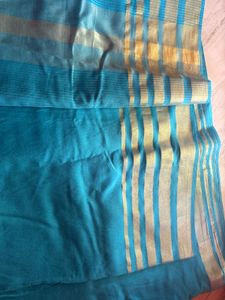 Beautiful Teal Saree with Gold Border