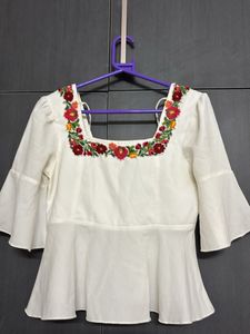 Floral Embroidered Peplum Top