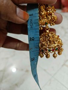 Intricate Gold Lakshmi Jhumka Earrings