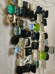 Assorted Earbud Cases and Earbuds