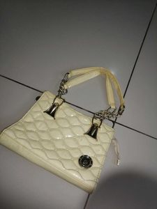 Elegant Cream Quilted Handbag