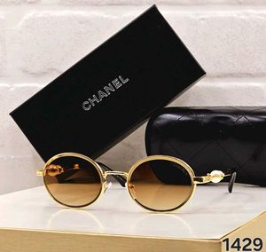 Chanel Round Sunglasses with Pearl Detail