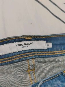 Distressed Blue Denim Jeans