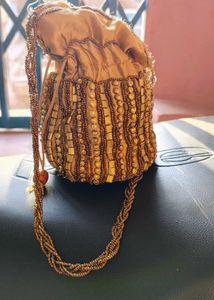 golden potli bag for function