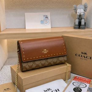 Coach Studded Monogram Crossbody Bag