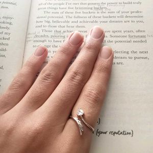 Elegant Winged Ring with Cubic Zirconia