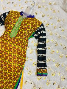 Vibrant Yellow Kurta Set with Striped Sleeves