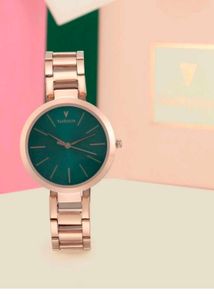 Elegant Gold Watch with Green Dial