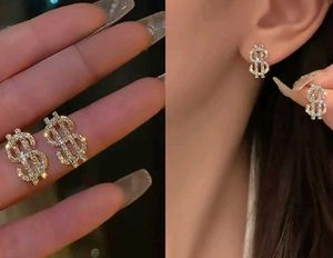 Sparkling Dollar Sign Earrings
