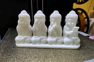 Set of 4 Adorable Buddha Figurines