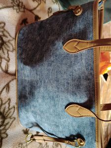 Stylish Denim Handbag with Leather Accents