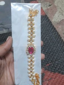 Elegant Pearl and Ruby Bajuband
