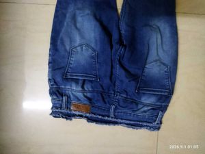 Ripped Blue Denim Jeans