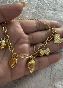 Charming Gold Tone Charm Bracelet