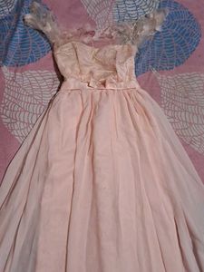 selling this peach floral tulle gown.