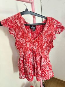Red Floral Smocked Peplum Top