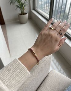 Elegant Gold & Red Beaded Bangle