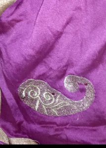 Shimmering Purple Fabric with Gold Trim